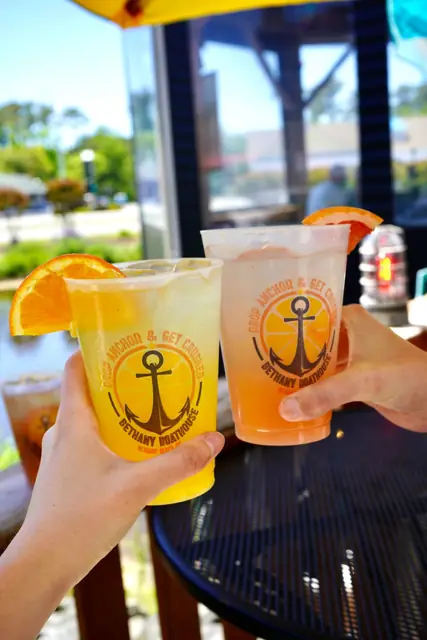 Orange and grapefruit crushes in Drop Anchor & Get Crushed cups