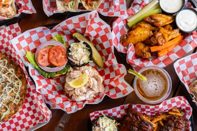 Shrimp salad sandwich, wings, ribs and a draft beer from above